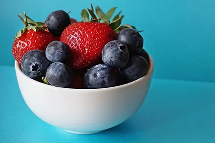 Bowl of strawberries and blueberries