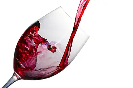 Red wine being poured into a glass